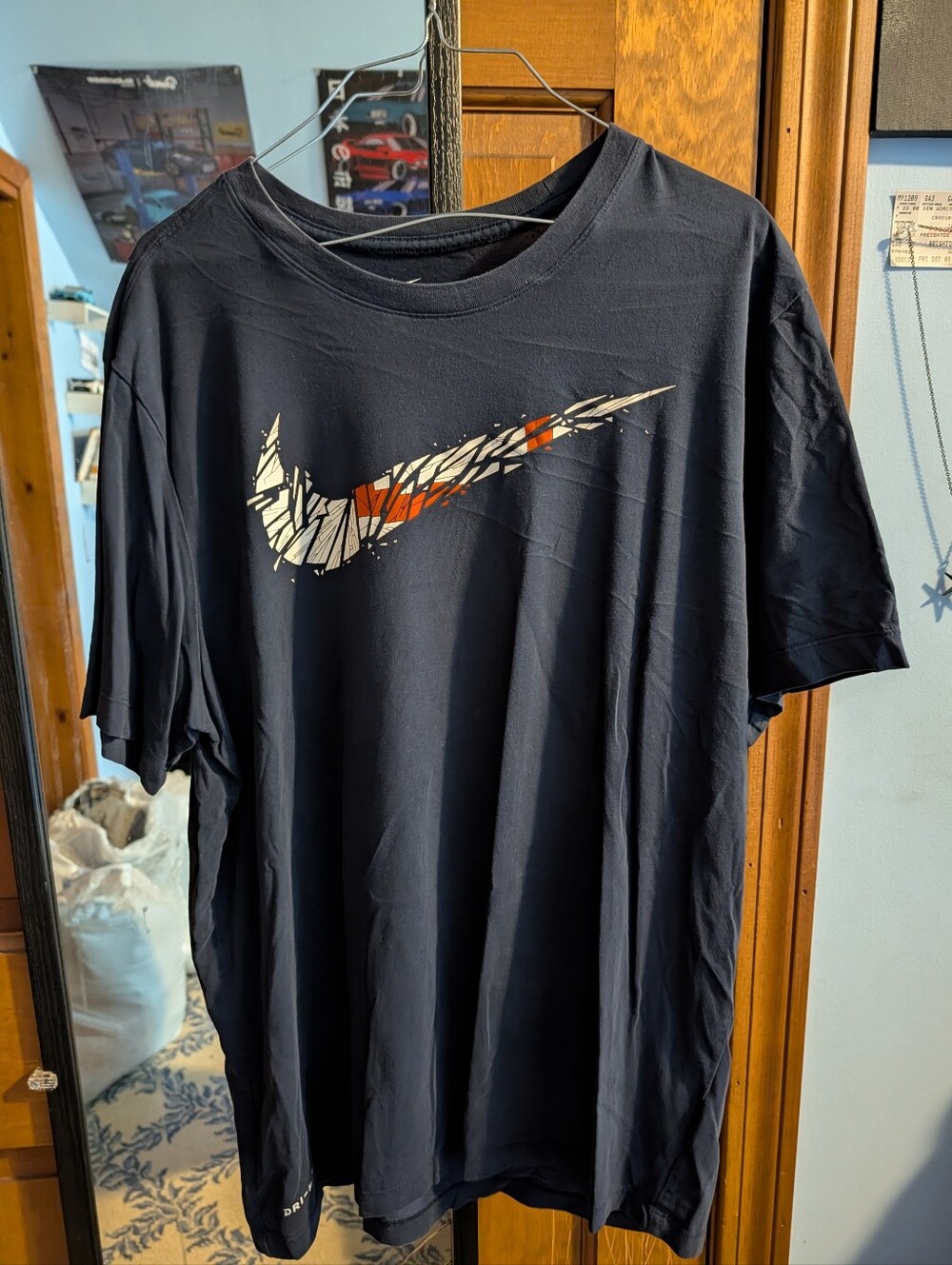 Nike Black Short Sleeve Tee with White and Orange Swoosh Graphic
